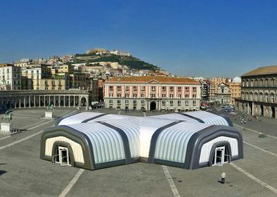Inflatable roof structures joined together to make a main event structure
